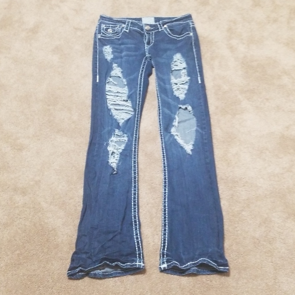 Ripped jeans with a slight bell bottom